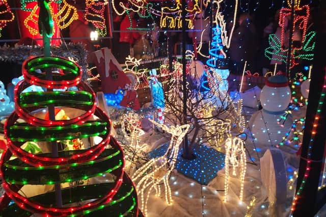 Christmas lights brighten up the night at Pulis family home