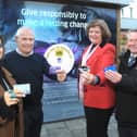 Cllr Margaret Griffiths, Phil Walker, and representatives from the Council's Community Safety and Strategic Housing Teams were the first to tap to donate