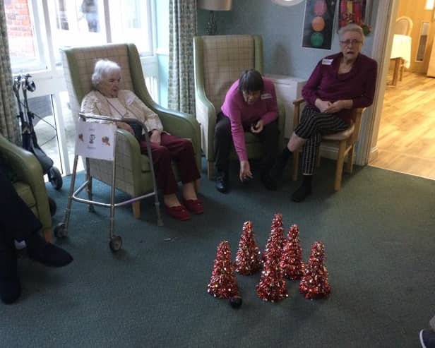 The residents enjoyed playing festive games at the Christmas party