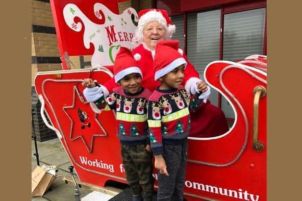 Two children were thrilled to meet Mrs Santa