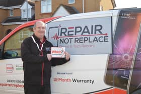 Mark Jones with Repair Not Replace Van (C) Repair Not Replace