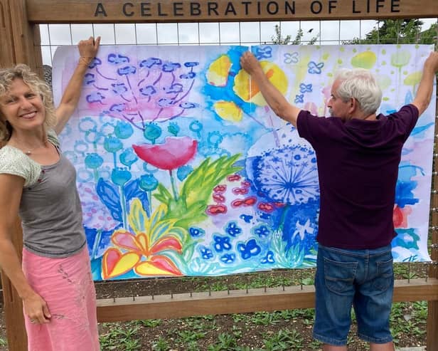 When the wall is complete it will reveal Jessica Ecott's vivid flower bed design
