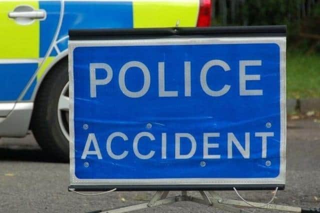 A woman was rushed to hospital following the crash
