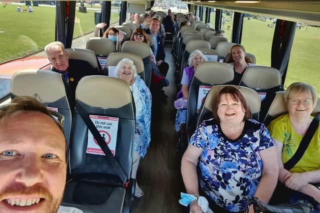 Passengers on a coach when Masons re-opened last year after lockdown