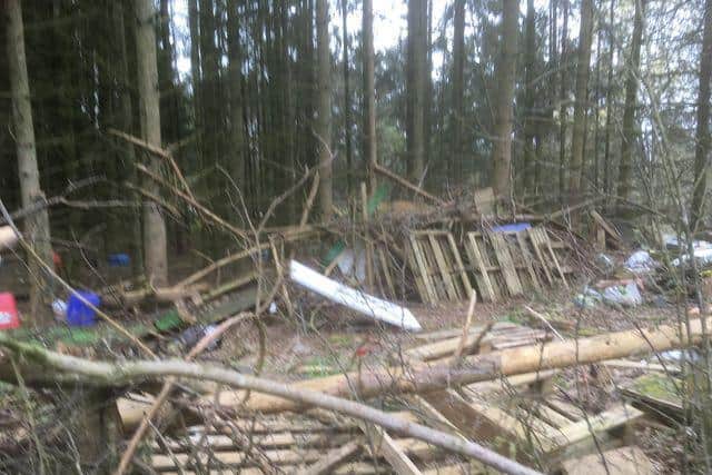Piles of dumped rubbish at a field entrance off the A5183