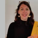 Emma with her new book, Self Contained