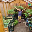 Four-year-old Douglas has been growing plants and vegetables in his garden