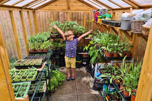 Four-year-old Douglas has been growing plants and vegetables in his garden