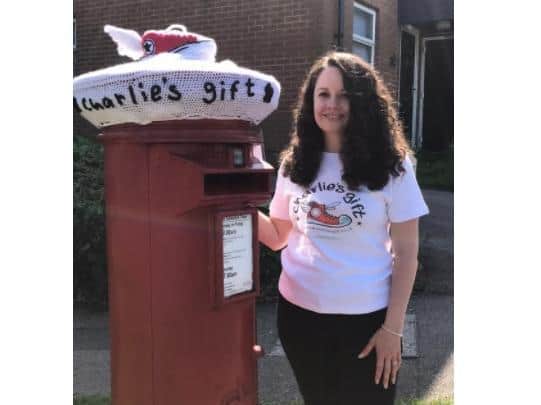 Nicole, founder of Charlie's Gift, with the postbox topper created by Jacqui