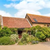 This five bedroom detached barn conversion in Gubblecote is on the market right now