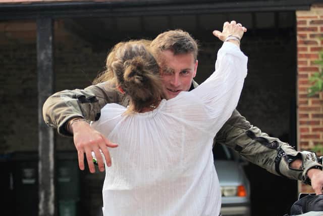 Jack and his mum on his return (C) Simon Double