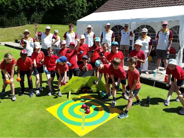 Youngsters from St Thomas More School were given a taster session in bowls by volunteers at Berkhamsted Bowls Club