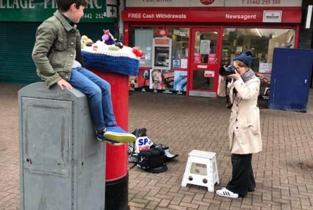 Nathan next to one of the postbox toppers