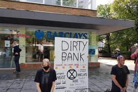 Environmental protesters target Barclays with 'dirty protest' (C) Clare Hobba