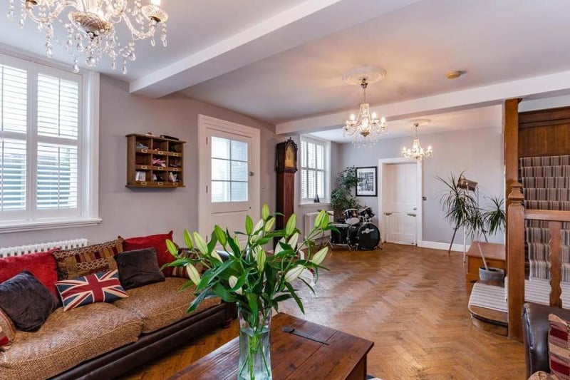 The entrance hall doubles up as a sitting room