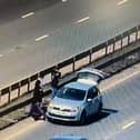 Where not to change a tyre - A vehicle stopped for a tyre change in the outside lane of the M1 earlier this year (C) Highways England