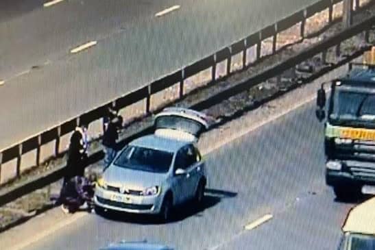 Where not to change a tyre - A vehicle stopped for a tyre change in the outside lane of the M1 earlier this year (C) Highways England