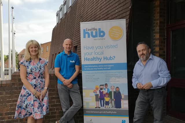 Fiona Thomson, Deputy Executive Member for Public Health and Community Safety, and Lee Bruce, one of the Healthy Hub co-ordinators, with Morris Bright MBE, Executive Member for Public Health and Community Safety