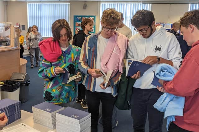 Happy students Joe Gallagher, Kai Gordon, Joe Harding and Ben Skipp collect their results, leavers hoodies and year books (C) The Hemel Hempstead School