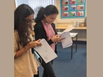Twin success! Sisters Asma and Afreen Ali celebrate their brilliant results (C) The Hemel Hempstead School