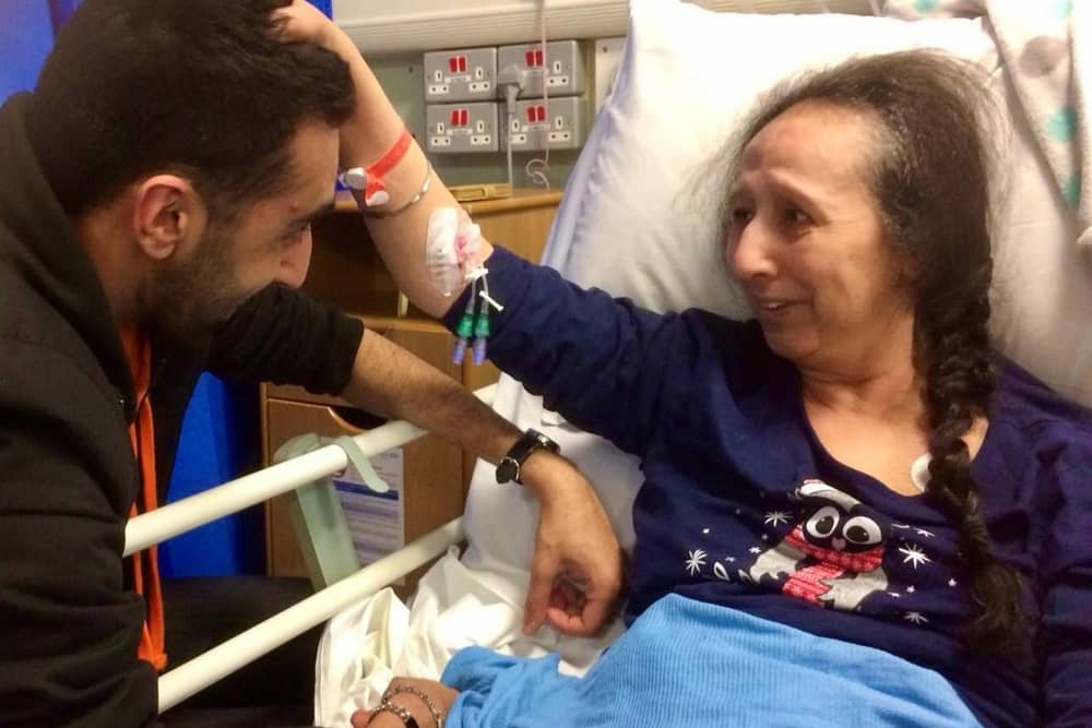 TJ with his mum Rashpal in hospital