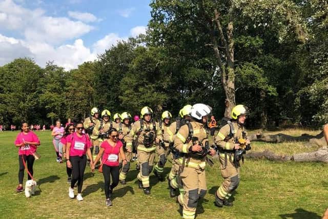 The team wore 3.5st of equipment throughout the 5k course