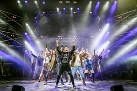 The show is 'something akin to a full-blown rock concert'