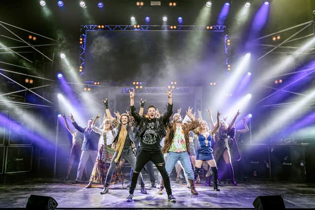 The show is 'something akin to a full-blown rock concert'
