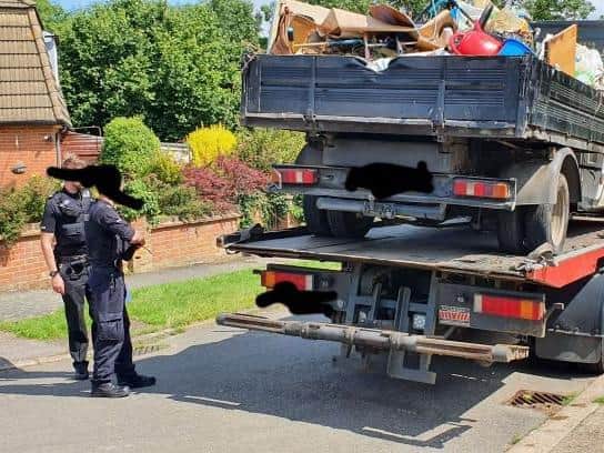 The now destroyed van being seized
