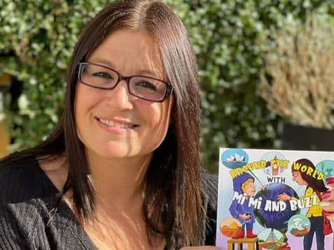 Amanda with the first children's book she has written