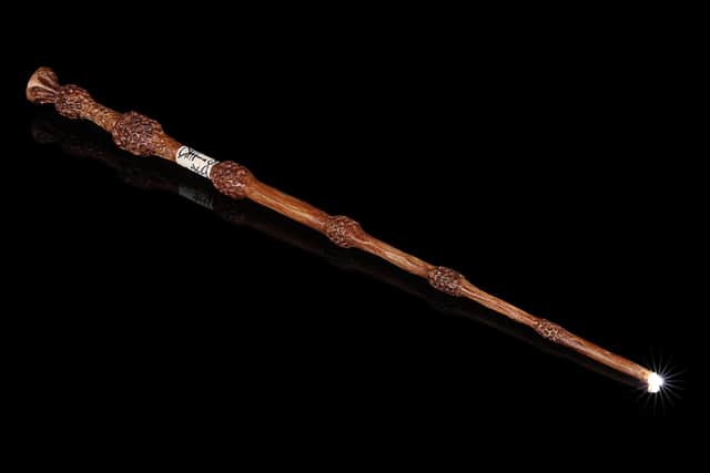 A •Harry Potter light-up hero elder wand from The Deathly Hallows.