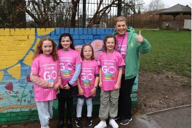 Headteacher Vicky Campos completing her Daily Mile alongside Boxmoor Primary School.