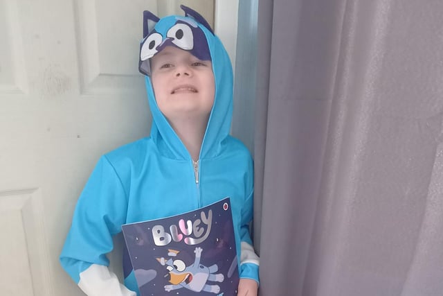 Joey, aged nine, dressed as Bluey from Goodnight Fruit Bat