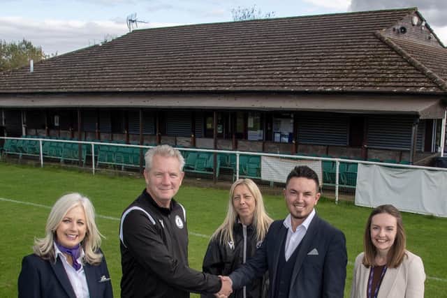 Rebecca Rooker, Chris Bozzmoss and Deirdre Brennan from Taylor Wimpey South Midlands photographed with Richard Smith, Chairman at the Football Club, and Nikki Dutton, one of the club's volunteers