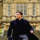 Christian Bale outside Mentmore Towers in Batman Begins