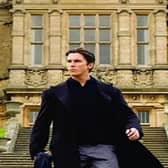 Christian Bale outside Mentmore Towers in Batman Begins