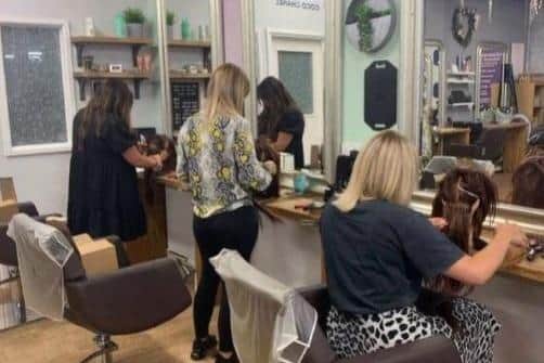 The team at SW Hair Styling Academy are celebrating after a business education award
