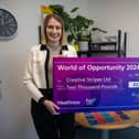 Lydia Berman (right), founder of Creative Stripes, is awarded a £2,000 Heathrow World of Opportunity grant for her neurodiverse-friendly Mapper Cards.