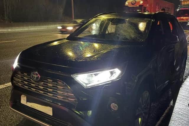Driver of stolen vehicle arrested after almost running over police ...