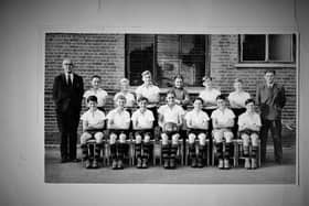 The 1949 Victoria School football team. Former member Ken Potter would like to know the names of the two boys on the right in the front row and the sports master