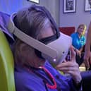 Resident immersed in under water world via VR.