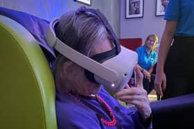 Resident immersed in under water world via VR.