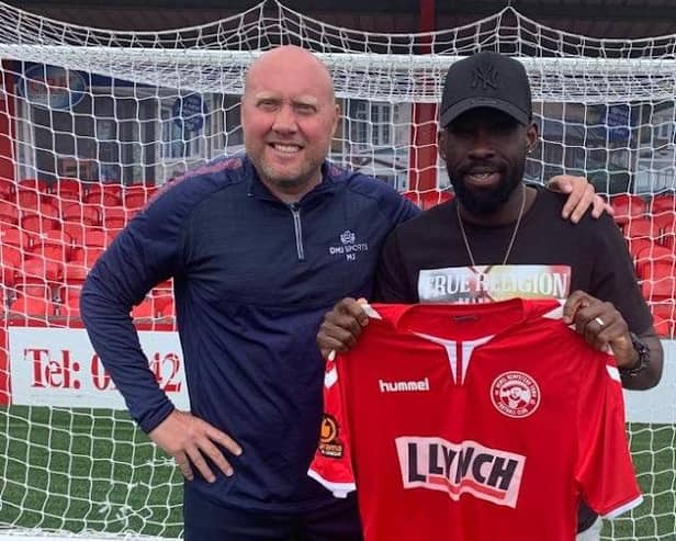 Mark Jones with one of his new signings, Godfrey Poku.