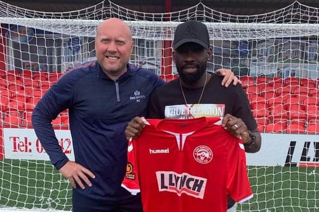 Mark Jones with one of his new signings, Godfrey Poku.