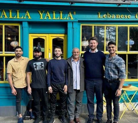 Mohamed and David Taylor MP with the team from Yalla Yalla on the Old Town High Street.