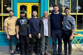 Mohamed and David Taylor MP with the team from Yalla Yalla on the Old Town High Street.