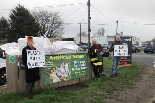Local activists are calling for a ban on plastic grass because it doesn't sustain wildlife and causes surface run-off, which can lead to flooding.