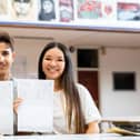 Dorian and Katy are delighted with their grades.