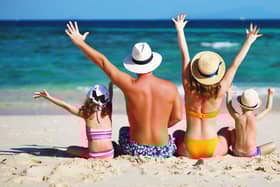 File photo of a family at the beach. Picture: Adobe stock