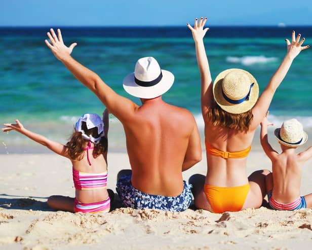 File photo of a family at the beach. Picture: Adobe stock